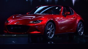 A Mazda MX-5RF car is displayed at the Beijing auto show