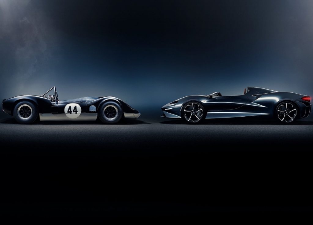 The blue-and-white McLaren-Elva M1A racer next to a dark-blue-gray 2021 McLaren Elva