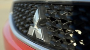 A close up view of the front grille of a Mitsubishi Mirage