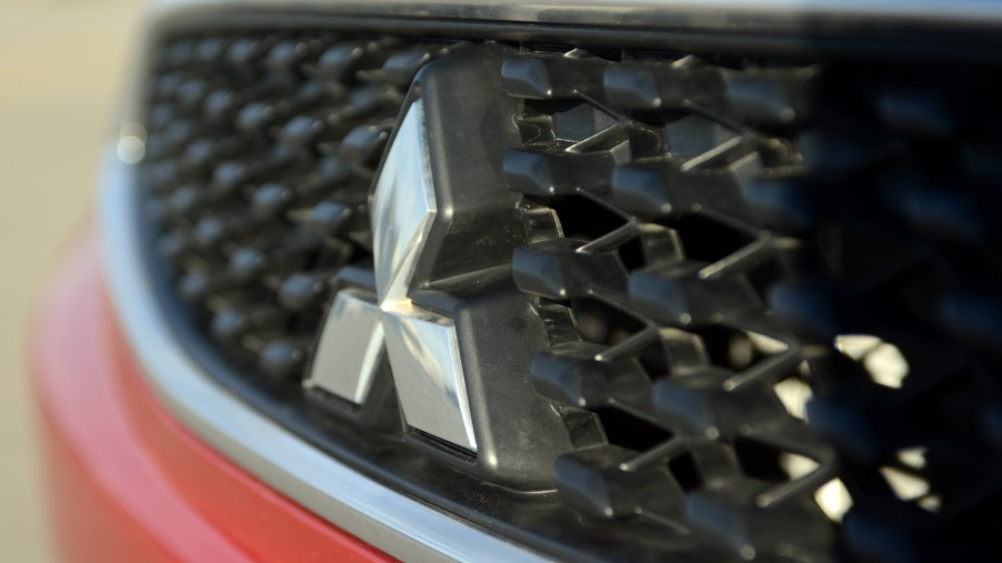 A close up view of the front grille of a Mitsubishi Mirage