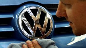 A man polishing a car