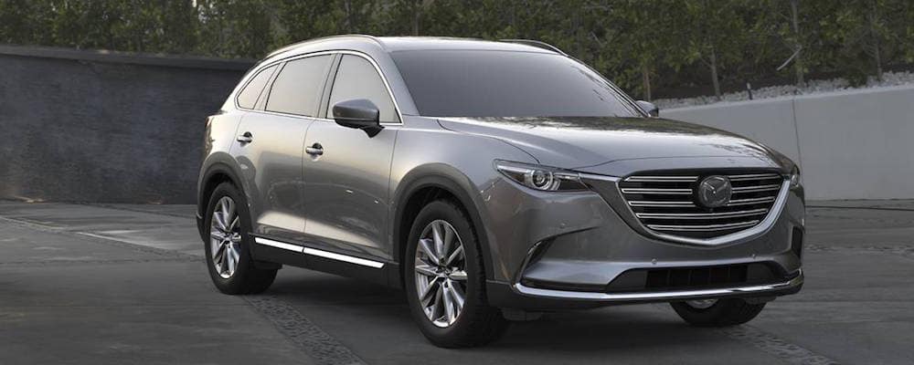 A silver 2019 Mazda CX-9 parked on the track.