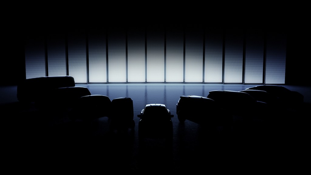 A dark image showing the silhouette of upcoming Kia's electric models.