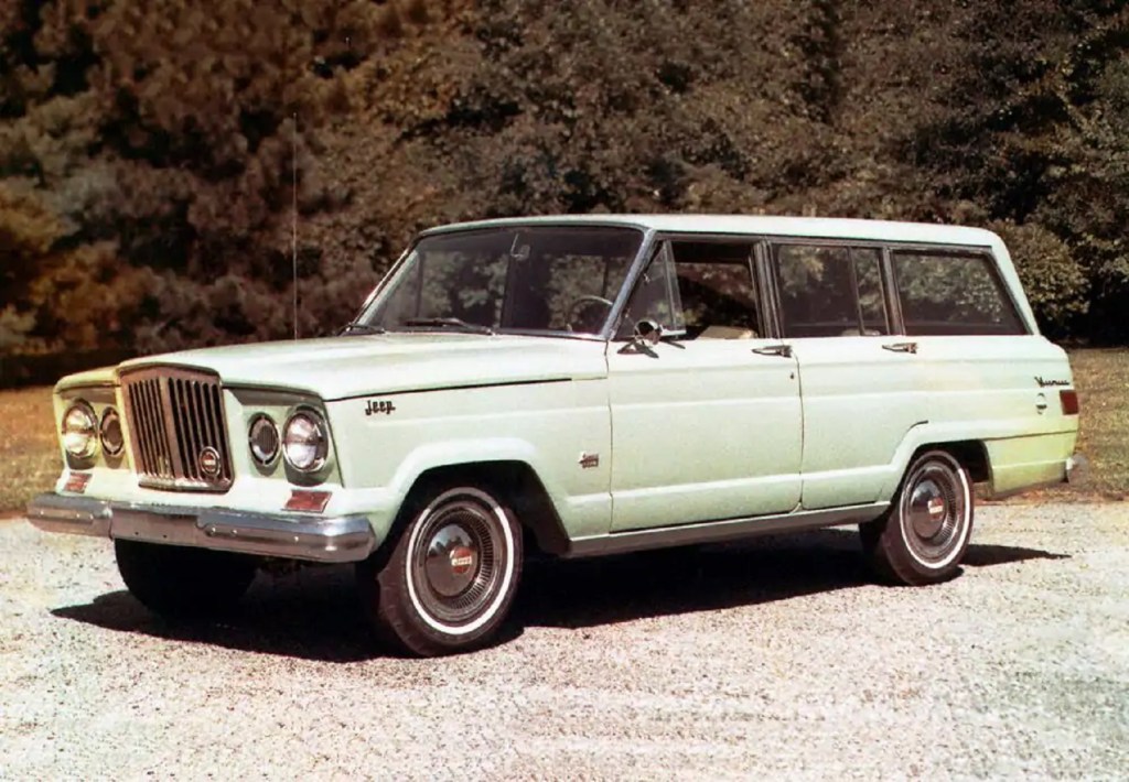 A pale-green 1963 Jeep Wagoneer