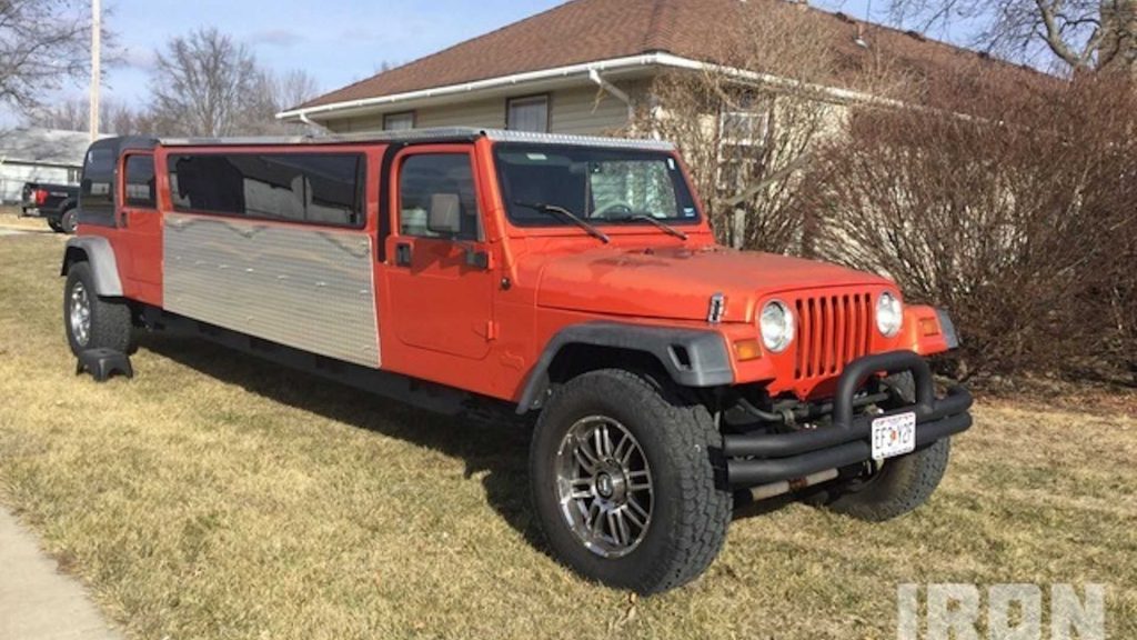 1997 red Jeep Wrangler stretched into a homemade limo 