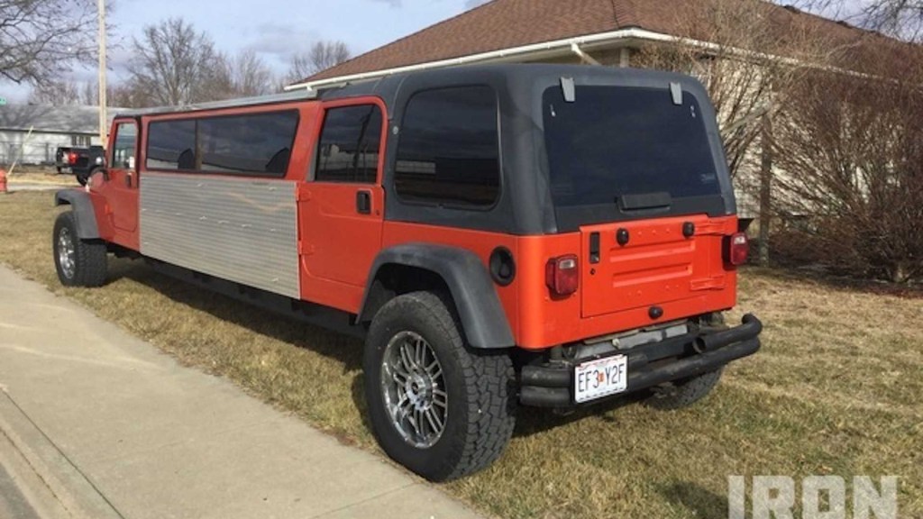 1997 red Jeep Wrangler stretched into a homemade limo