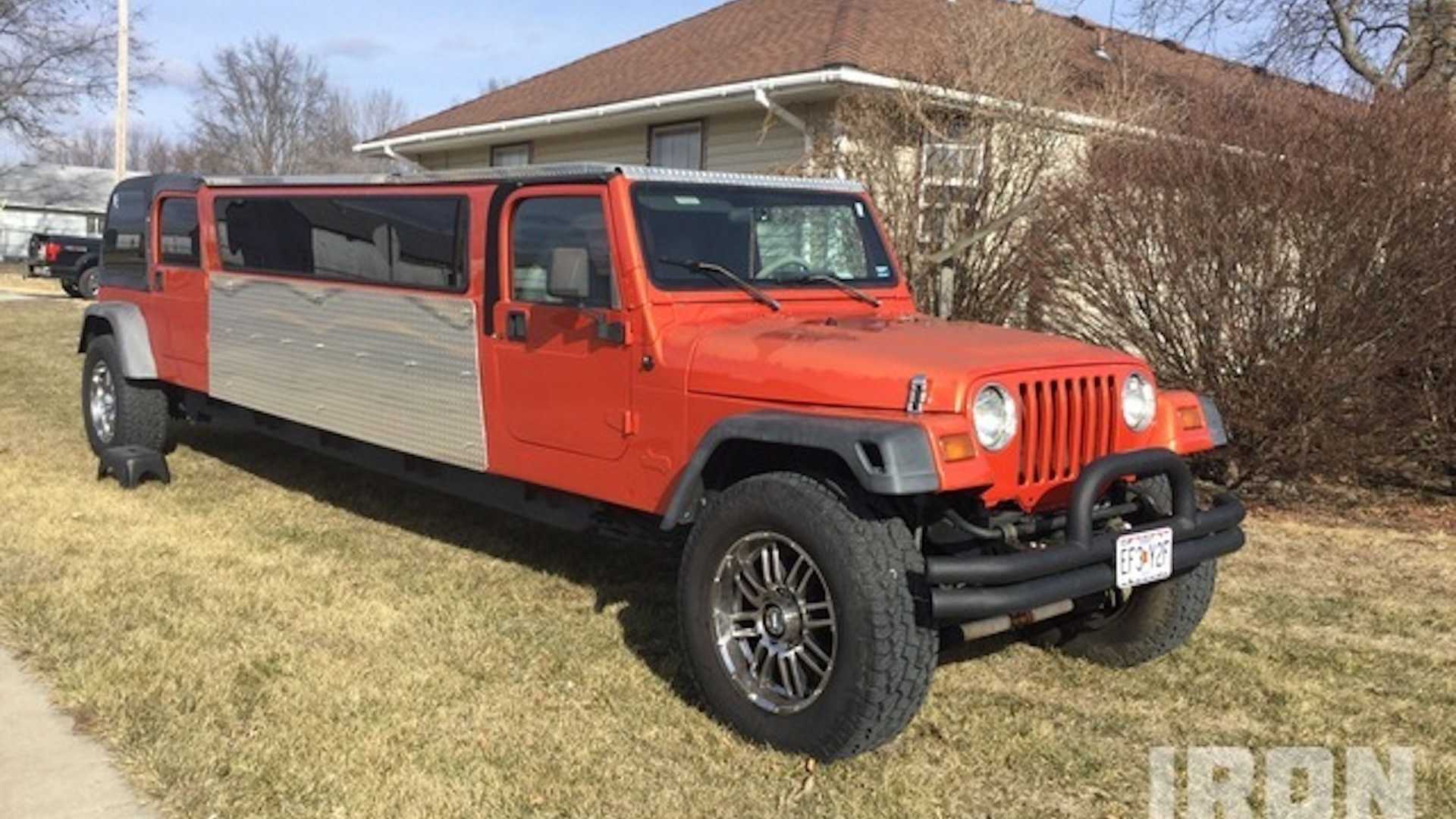 1997 red Jeep Wrangler stretched into a homemade limo