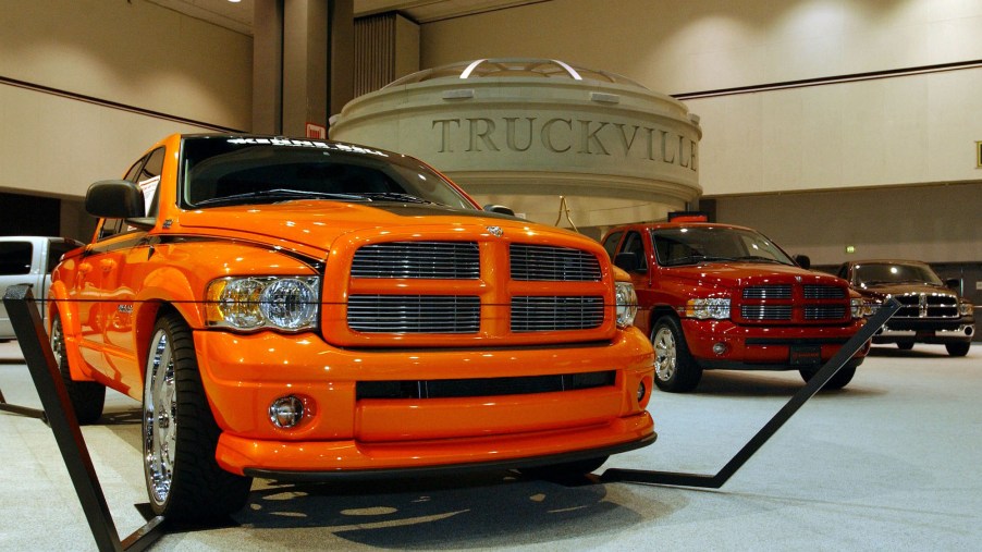 2003 Dodge Ram 2500 pickup trucks stand on display during media day at the Greater Los Angeles Auto Show on January 3, 2003, at the Los Angeles Convention Center.
