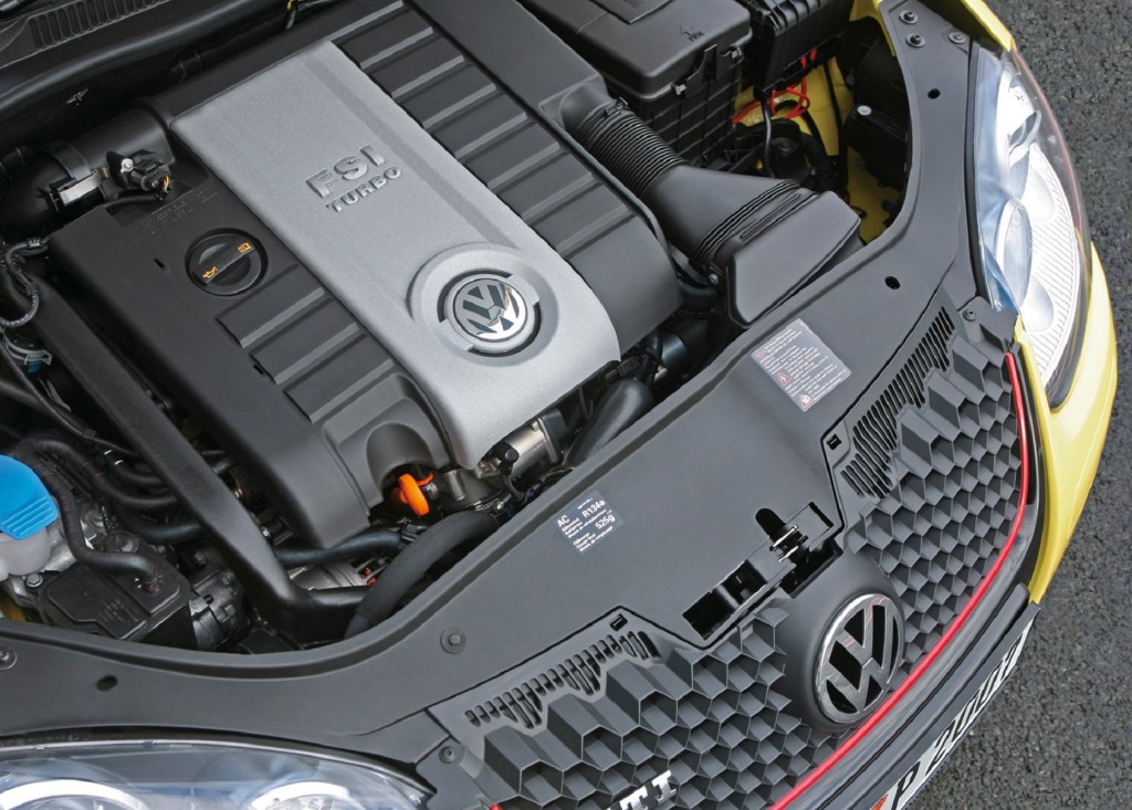 The 2.0T EA888 engine inside a yellow 2007 Volkswagen GTI Pirelli Edition
