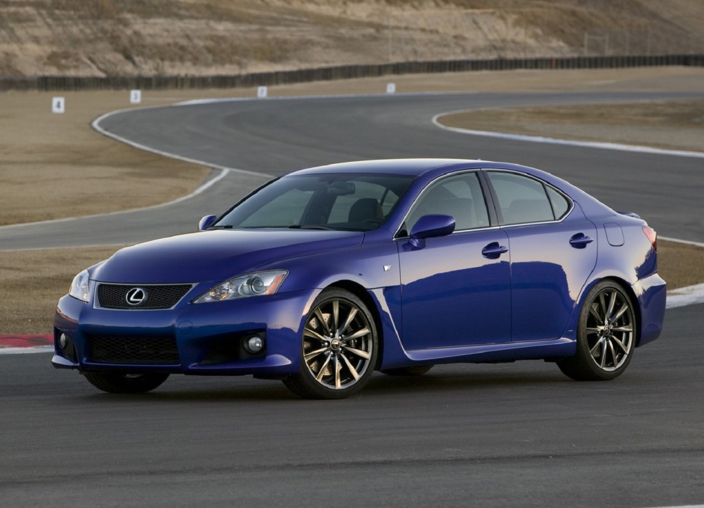 A blue 2008 Lexus IS F parked on a desert racetrack