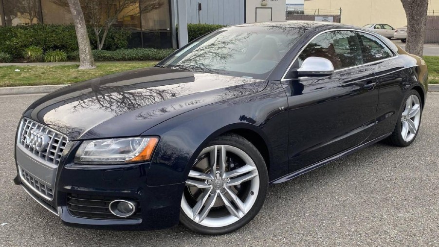 A dark-blue 2009 Audi S5 Coupe parked in a lot