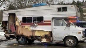 The tattered remnants of the rig the RV driver crashed in Seattle police chase