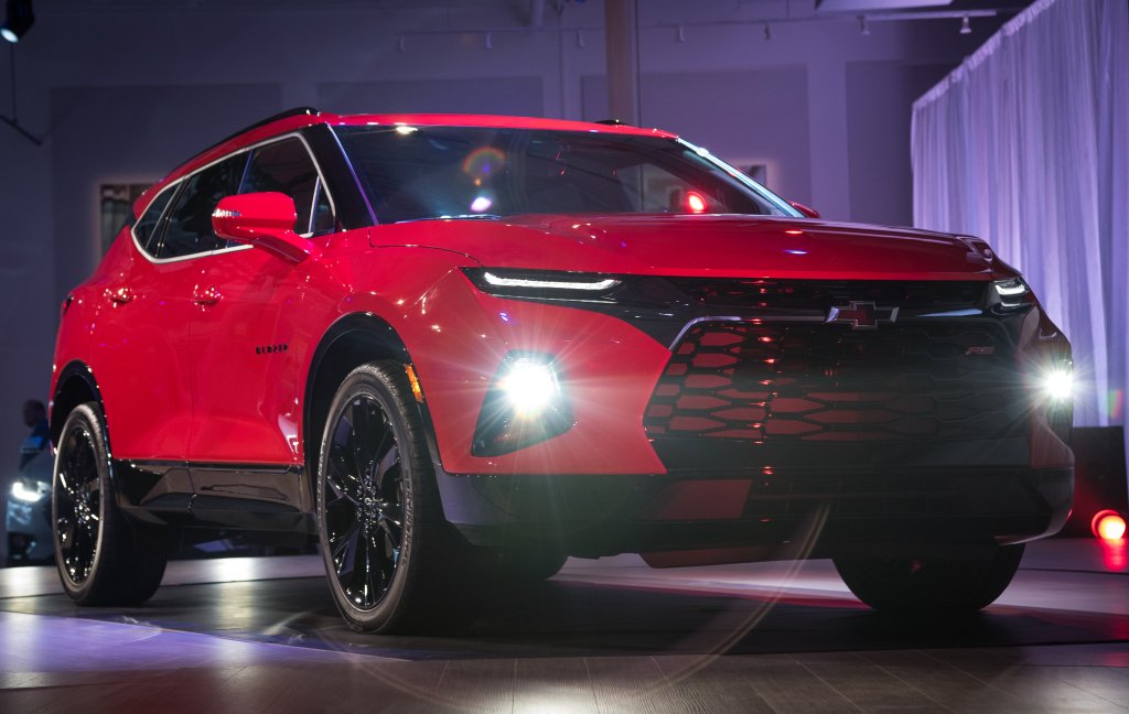 A red 2019-2021 Chevy Blazer on display during the SUV's reveal event