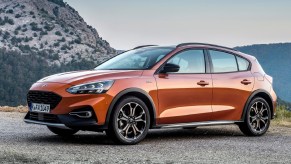 An orange 2019 Ford Focus Active wagon on a mountain road