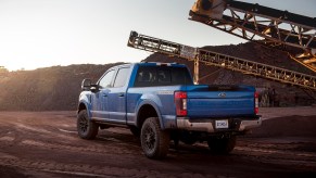 A Lightning Blue 2020 Ford F-350 Tremor XLT Super Duty pickup truck on a construction site