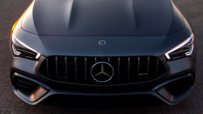 The grille and hood of a silver 2020 Mercedes-AMG CLA 45 compact luxury sedan