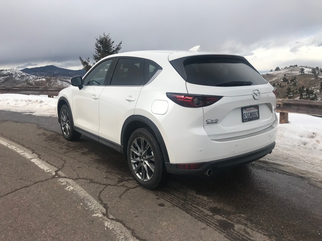 rear shot of 2021 Mazda CX-5 on a mountain road