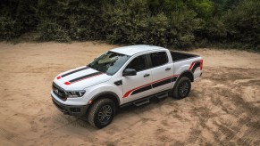 A white 2021 Ford Ranger Tremor XLT off-road pickup truck with black and red sticker details