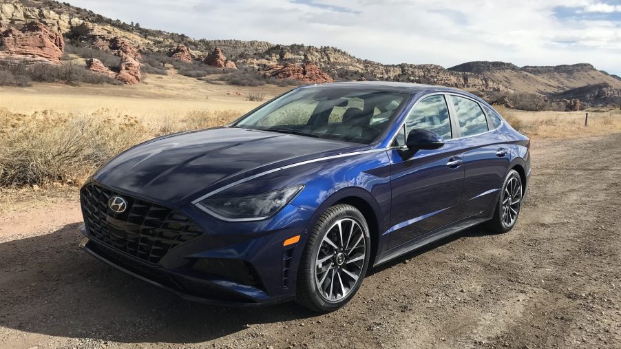2021 Hyundai Sonata Limited parked in the desert with mountains in the background