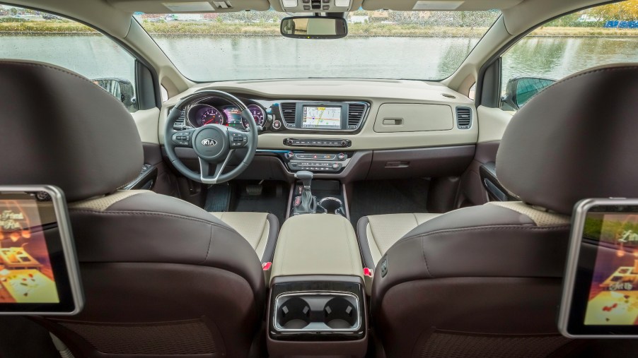 Beige leather interior of a 2021 Kia Sedona minivan