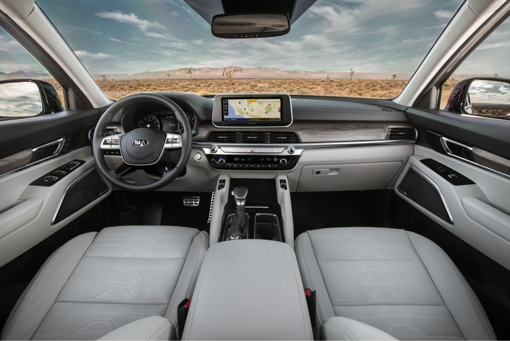 The dashboard and white-leather-upholstered front seats of the 2021 Kia Telluride