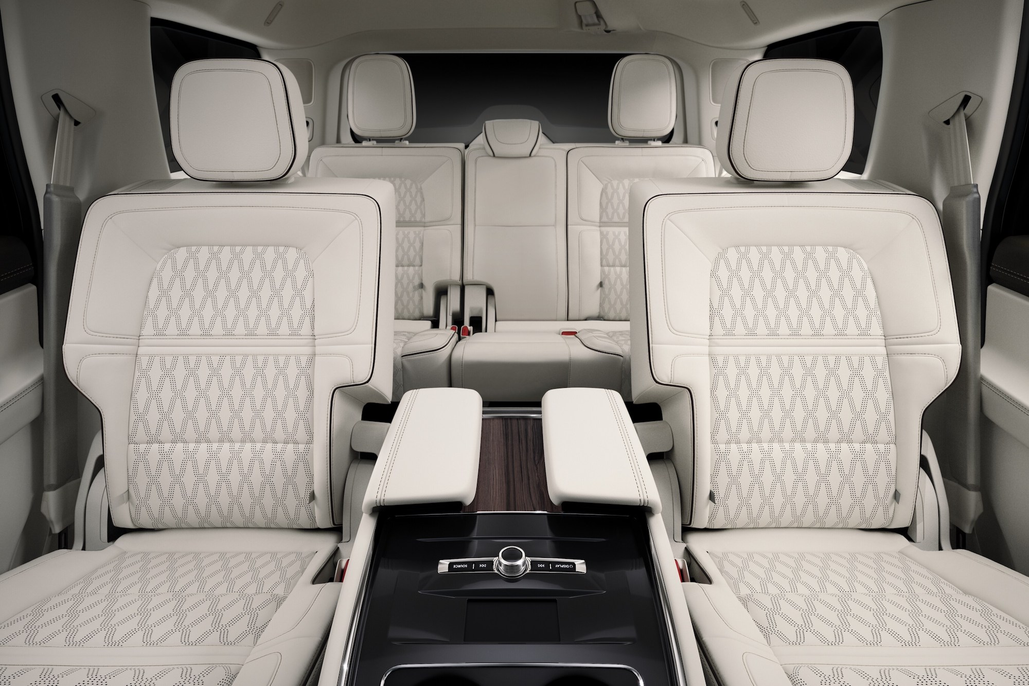 A 2021 Lincoln Navigator Black Label SUV's white and gray leather seating with Chalet theming