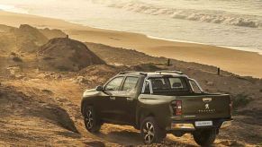 2021 Peugeot Landtrek pickup crew cab at the beach rear 3/4