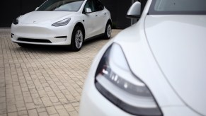 Two white Tesla Model S electric vehicles for sale outside a dealership at the Easton Town Center Mall in Columbus, Ohio, U.S., on Thursday, Jan. 7, 2021.