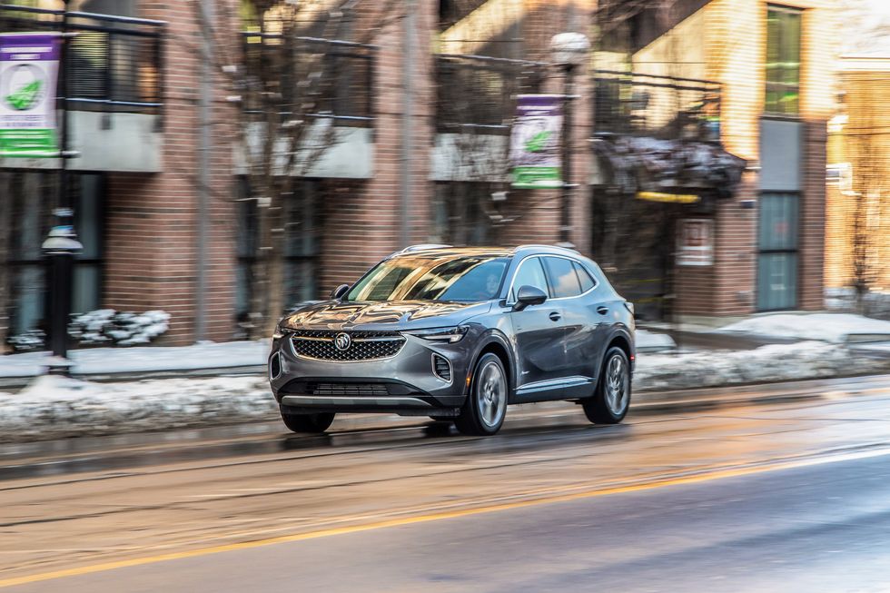 The 2021 Buick Envision driving on city street