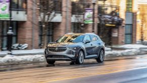 The 2021 Buick Envision driving on city street