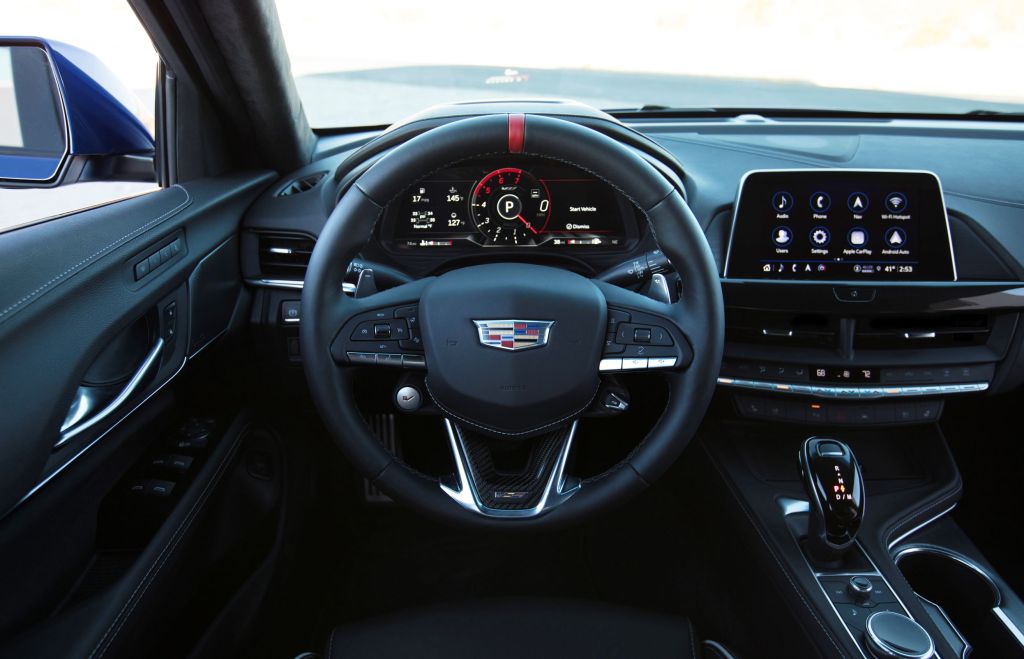 The driver's seat, gauge cluster, and dashboard of the 2022 Cadillac CT4-V Blackwing