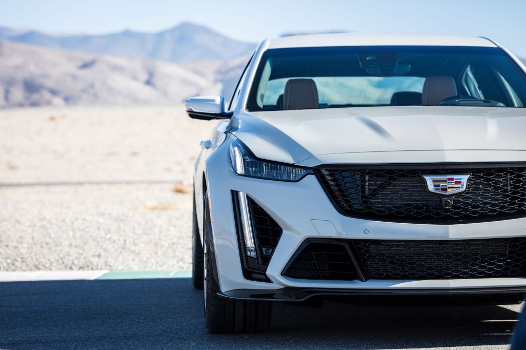 The front view of a white 2022 Cadillac CT5-V Blackwing in the desert