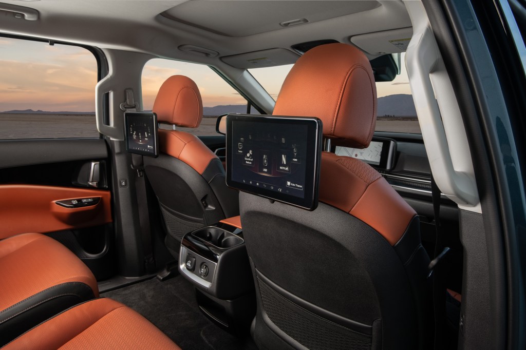 A look at the interior of the 2022 Kia Carnival, which has available leather seats and a dual-screen rear seat entertainment system