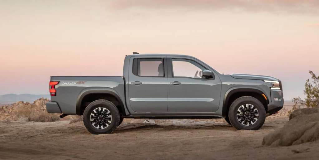 Gray 2022 Nissan Frontier parked in the desert at dusk