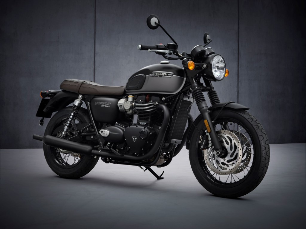 The matte-black-and-gray 2022 Triumph Bonneville T120 Black in front of a gray background