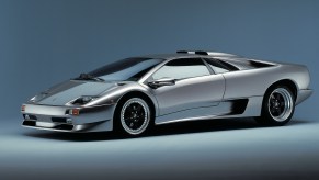 An image of a gray Lamborghini Diablo SV in a studio.