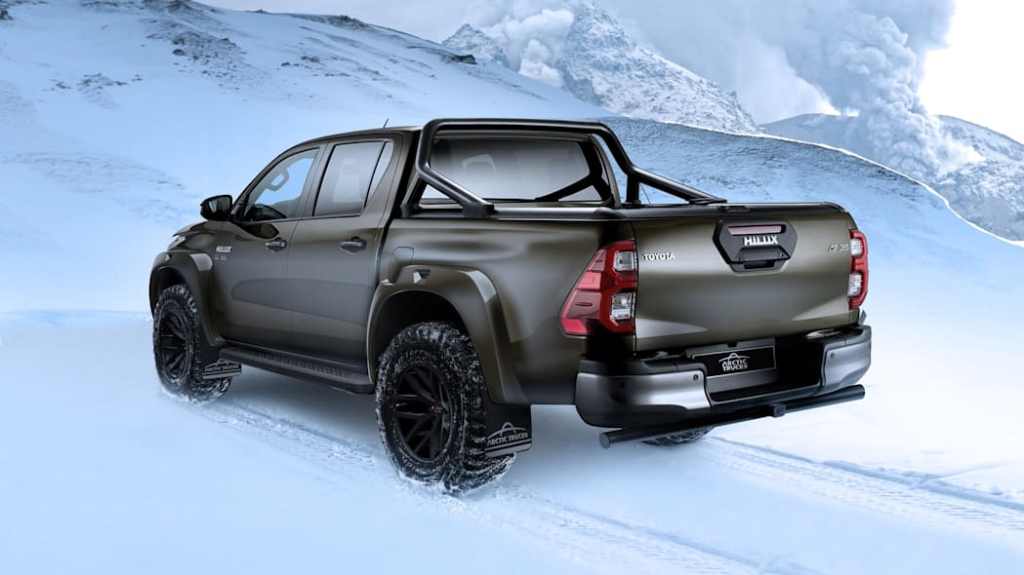 a rear three-quarter view of the Arctic Truck AT35 Toyota Hilux in the snow