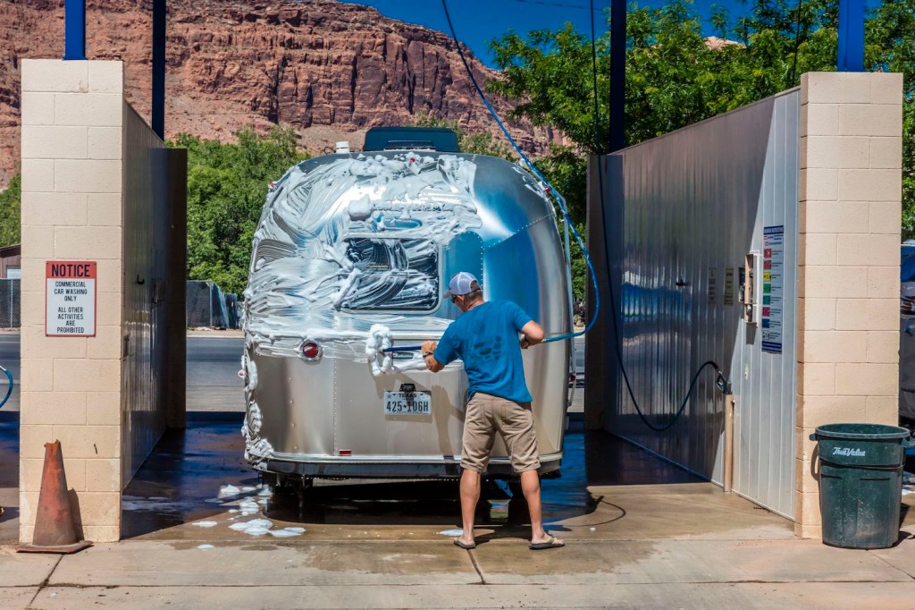 Airstream Trailer at car wash being cleaned in Moab, Utah
