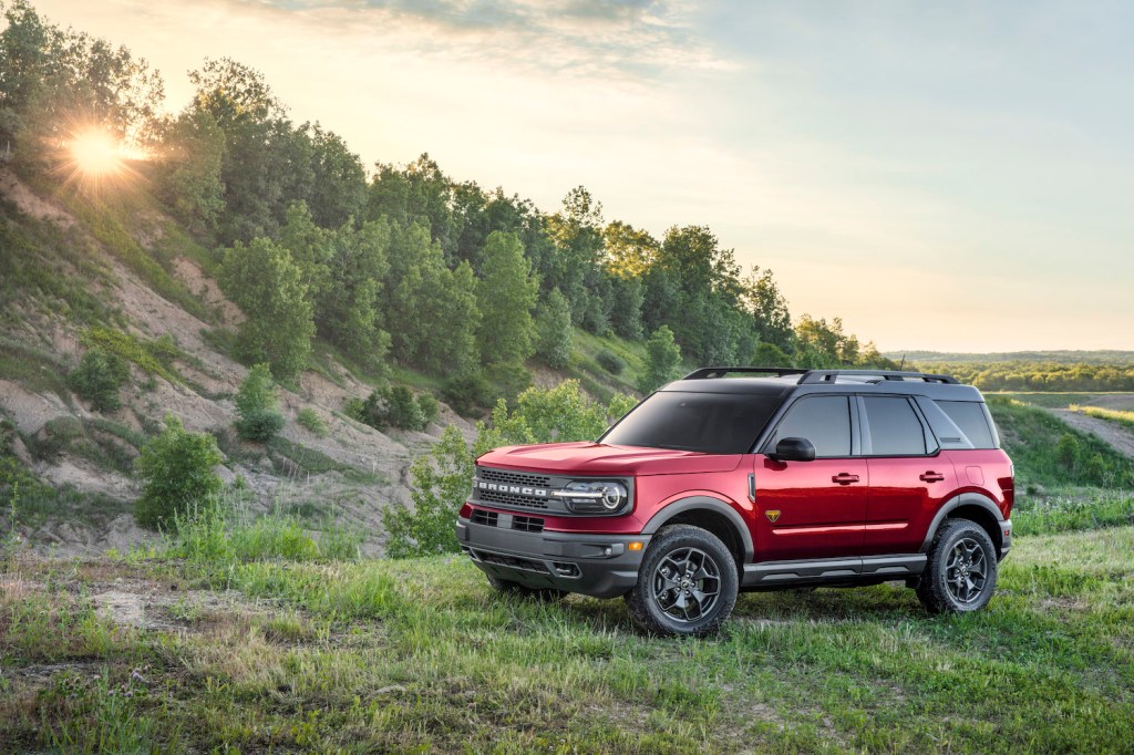 2021 Ford Bronco parked on a grassy hill