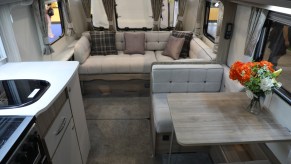 The interior of a camper van on display at an RV show