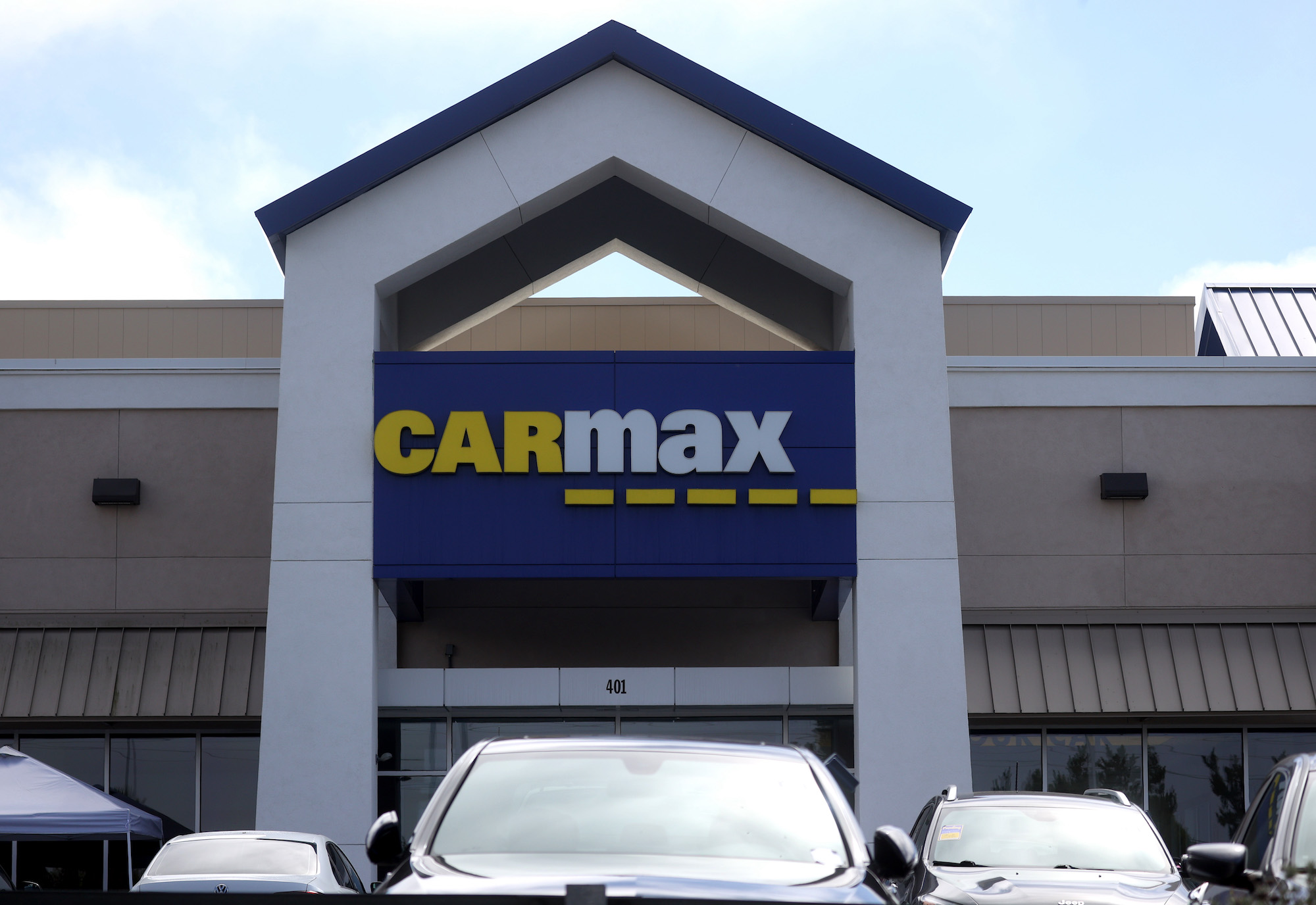 A CarMax sign on the front of a CarMax superstore on September 24, 2020, in Colma, California