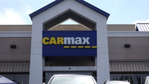 A CarMax sign on the front of a CarMax superstore on September 24, 2020, in Colma, California