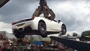 458 Ferrari Spider clutched in claws