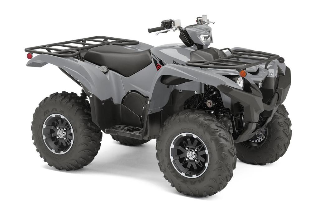 a press photo of a gray yamaha grizzly against a white backdrop