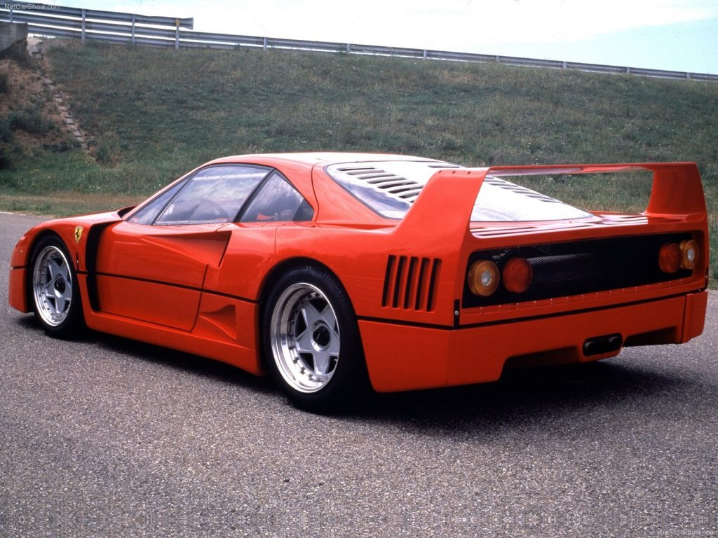 An image of a red Ferrari F40 outdoors.