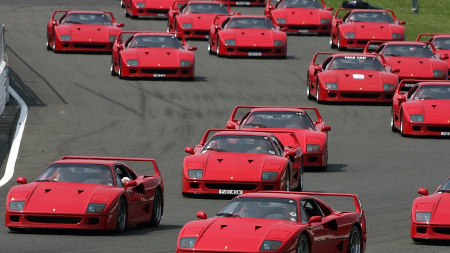 An image of many Ferrari F40 models out on track.