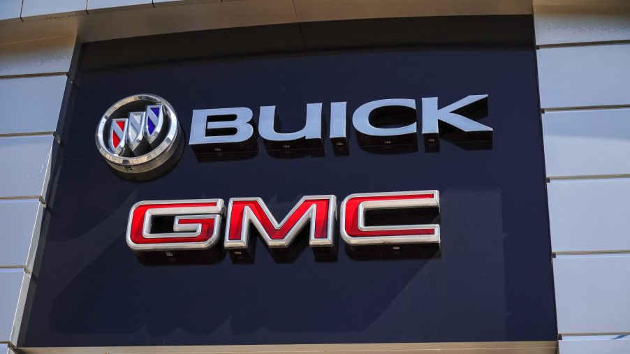 Buick and GMC company logos seen on one of their car dealerships showrooms