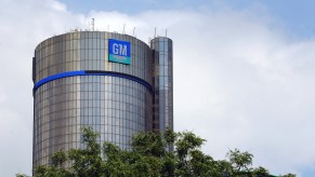 A blue and gray GM logo on General Motors' world headquarters in Detroit