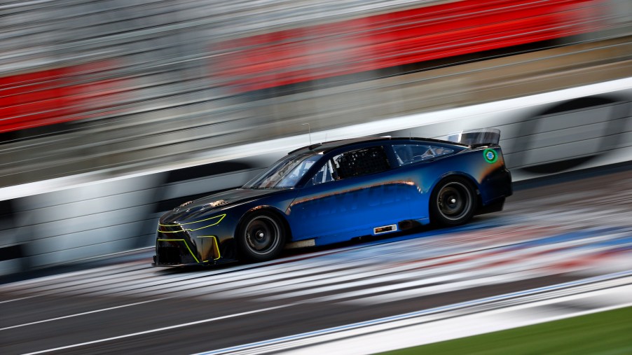 An image of NASCAR's next-gen car testing on a racetrack.