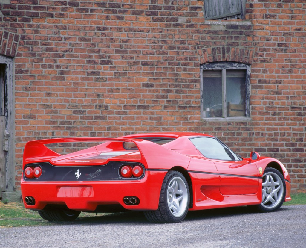 An image of a Ferrari F50 parked outside.